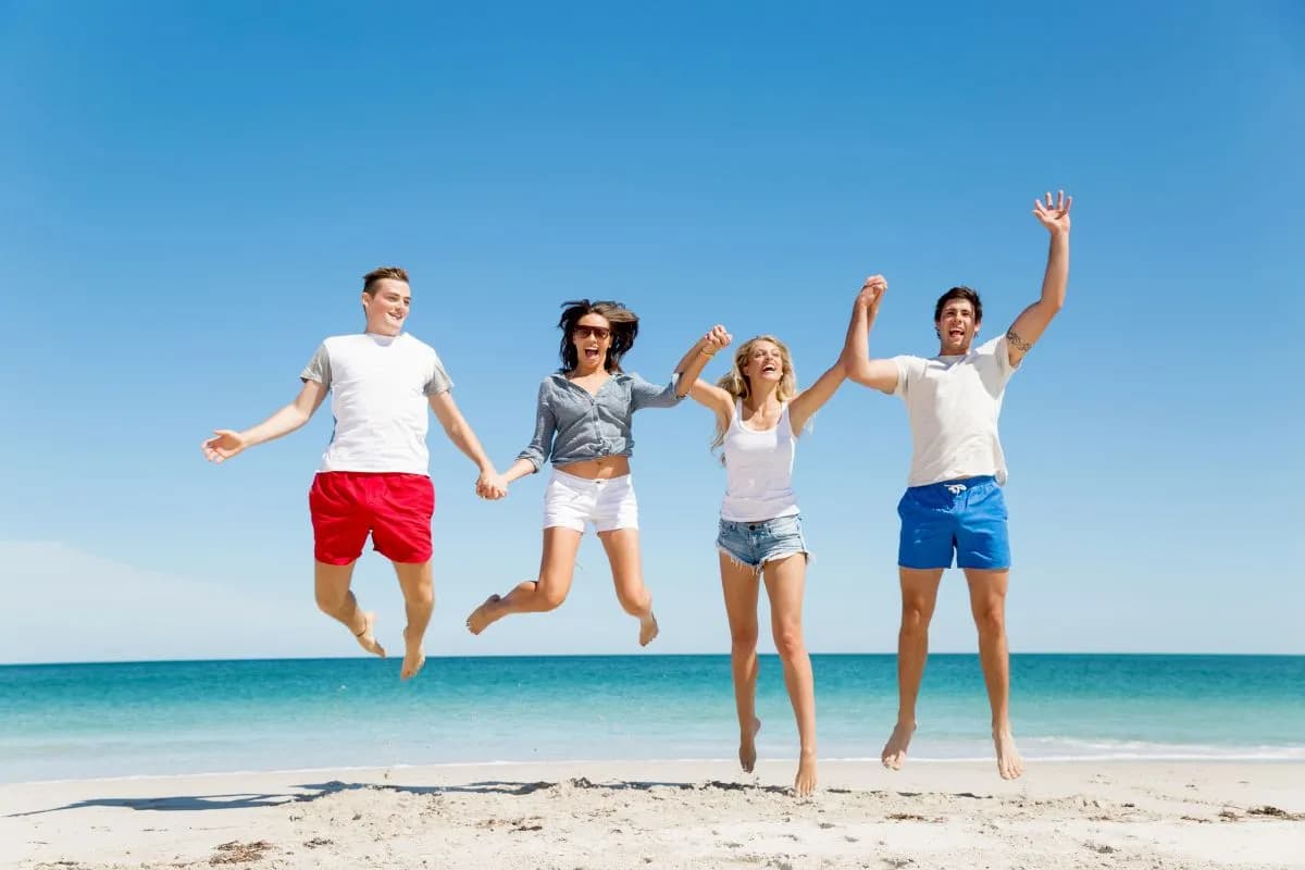 Smiling adults enjoying time at beach